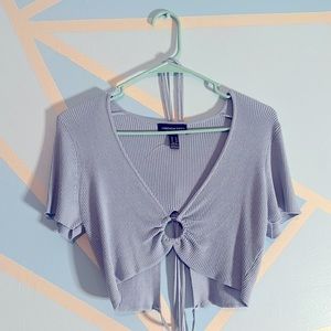 This is a cropped top shirt.